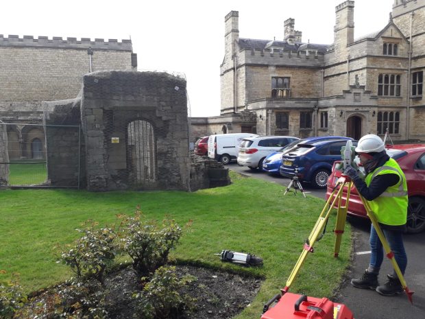 Female using surveying equipment at Lincoln Bishops Palace