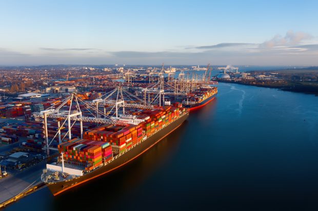 Aerial view of colorful containers on cargo ships at the port of Southampton,